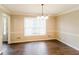 Bright dining room with hardwood floors and crown molding at 2848 Creekwood Dr, Snellville, GA 30078