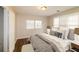 Modern bedroom with a stylish bed and decorative artwork at 2848 Creekwood Dr, Snellville, GA 30078