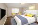 Main bedroom with hardwood floors and virtual staging at 2848 Creekwood Dr, Snellville, GA 30078