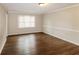Living room featuring hardwood floors and neutral walls at 2848 Creekwood Dr, Snellville, GA 30078