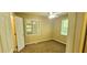 Bedroom with carpet, neutral walls, and two windows at 2470 Cambridge Hills Rd, Cumming, GA 30041