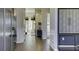 Bright entryway with hardwood floors and access to other rooms at 557 Saltbox Ln, Mcdonough, GA 30252