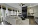 Spacious living room with fireplace, large windows and stylish furnishings at 557 Saltbox Ln, Mcdonough, GA 30252