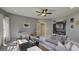 Game room with sectional sofa, media console and game table at 557 Saltbox Ln, Mcdonough, GA 30252