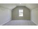 Spacious walk-in closet with ample hanging space and a window at 557 Saltbox Ln, Mcdonough, GA 30252
