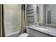 Bathroom with shower/tub combo, granite countertop, and neutral colors at 557 Saltbox Ln, Mcdonough, GA 30252