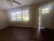 Bright living room with hardwood floors and lots of natural light at 1870 Glen Echo Dr, Decatur, GA 30032