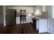 Modern kitchen with stainless steel appliances and granite countertops at 1870 Glen Echo Dr, Decatur, GA 30032