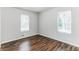 Spacious bedroom with hardwood floors and two windows at 2069 Chicago Nw Ave, Atlanta, GA 30314