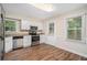 Bright kitchen featuring stainless steel appliances and granite countertops at 2519 Brentwood Rd, Decatur, GA 30032