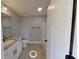 Simple bathroom with a vanity, toilet and bathtub at 542 Little Vine Church Rd, Villa Rica, GA 30180