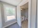 Small bathroom with toilet and vanity at 542 Little Vine Church Rd, Villa Rica, GA 30180
