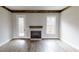 Living room with hardwood floors and fireplace at 542 Little Vine Church Rd, Villa Rica, GA 30180