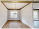 Bright dining room with hardwood floors and chandelier at 542 Little Vine Church Rd, Villa Rica, GA 30180