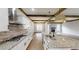 Kitchen with stainless steel appliances and granite countertops at 542 Little Vine Church Rd, Villa Rica, GA 30180