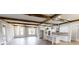 Modern kitchen with white cabinets and granite island at 542 Little Vine Church Rd, Villa Rica, GA 30180