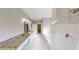 Elegant bathroom with soaking tub, double vanity, and granite countertop at 542 Little Vine Church Rd, Villa Rica, GA 30180