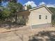 Ranch-style home with a spacious yard and carport at 6862 Old Beulah Rd, Lithia Springs, GA 30122