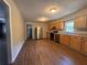 Eat-in kitchen with stainless steel appliances and light wood cabinets at 6862 Old Beulah Rd, Lithia Springs, GA 30122
