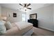 Bright bedroom with a queen bed and dresser at 3349 Verdi Ln, Kennesaw, GA 30144