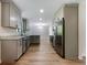 Modern kitchen with stainless steel appliances and gray cabinets at 2140 Fern Valley Sw Dr, Atlanta, GA 30331