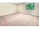 Bright bedroom with neutral walls and new carpet at 2140 Fern Valley Sw Dr, Atlanta, GA 30331