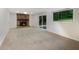 Spacious basement with neutral carpeting and a stone fireplace at 2140 Fern Valley Sw Dr, Atlanta, GA 30331