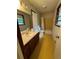 Clean bathroom with shower/tub combo and wood vanity at 612 Mincey Woods Ct, Stone Mountain, GA 30087