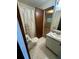 Bathroom with shower/tub combo, white vanity, and hexagonal tile floor at 612 Mincey Woods Ct, Stone Mountain, GA 30087