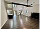 Open concept living room with kitchen view at 5432 Post Road Pass, Stone Mountain, GA 30088