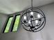 Modern spherical chandelier with exposed bulbs at 5432 Post Road Pass, Stone Mountain, GA 30088