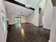 High ceiling living room with hardwood floors at 5432 Post Road Pass, Stone Mountain, GA 30088