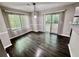 Dining room with sliding glass doors and window at 5432 Post Road Pass, Stone Mountain, GA 30088