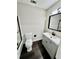 Modern bathroom with vanity, toilet, and shower/tub combo at 5432 Post Road Pass, Stone Mountain, GA 30088