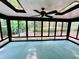 Sunroom with ceiling fan and view of backyard at 5432 Post Road Pass, Stone Mountain, GA 30088