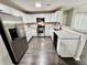 Modern kitchen with stainless steel appliances and granite counters at 5432 Post Road Pass, Stone Mountain, GA 30088
