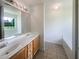 Double vanity bathroom with garden tub and separate shower at 5233 Walnut Ct, Lithonia, GA 30038