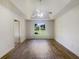 Large bedroom with ceiling fan and wood-look flooring at 5233 Walnut Ct, Lithonia, GA 30038