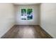 Spacious office featuring wood-look flooring and a large window at 5233 Walnut Ct, Lithonia, GA 30038
