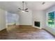Living room with vaulted ceiling, fireplace and wood-look flooring at 5233 Walnut Ct, Lithonia, GA 30038
