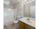 Clean bathroom with a shower/tub combo and updated vanity at 5233 Walnut Ct, Lithonia, GA 30038