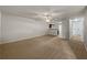 Open living room with neutral walls and carpet at 3583 Rock Ridge Dr, Rex, GA 30273