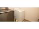 Convenient laundry room with washer and dryer at 249 Chadwyck Ln, Canton, GA 30115