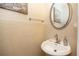 Updated powder room with pedestal sink and neutral tile at 249 Chadwyck Ln, Canton, GA 30115