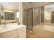 Elegant bathroom with double sinks, a large soaking tub, and a separate shower at 249 Chadwyck Ln, Canton, GA 30115