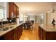 Open kitchen with breakfast area and views into the Gathering room at 249 Chadwyck Ln, Canton, GA 30115