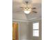 Bedroom with ceiling fan and window, neutral colored walls at 249 Chadwyck Ln, Canton, GA 30115