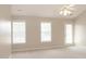 Large main bedroom with ceiling fan and access to deck at 249 Chadwyck Ln, Canton, GA 30115