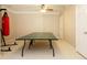 Finished basement with ping pong table and punching bag at 249 Chadwyck Ln, Canton, GA 30115