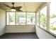 Screened porch with ceiling fan and wooded views at 249 Chadwyck Ln, Canton, GA 30115